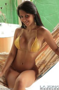 Drop Dead Sexy Latina In Gold Micro Swimsuit